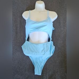 bathing suit.  Swimsuit, one piece, light blue. New without tags,  women's size